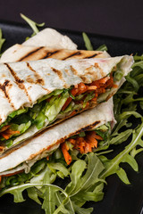 Vegetarian delicious pita with arugula and carrots