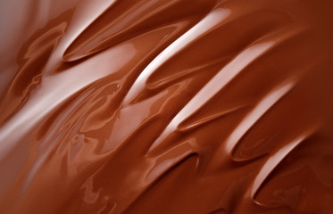 Chocolate background. Melted chocolate.