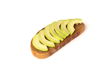 Bread with avocado isolated on white background.
