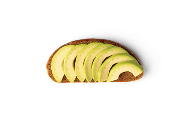 Bread with avocado isolated on white background.