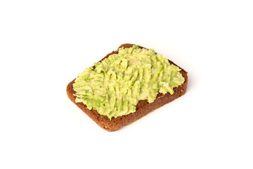 Bread with avocado isolated on white background.
