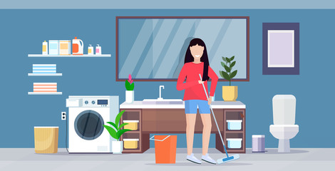 housewife mopping floor smiling woman cleaner holding mop doing housework cleaning service housekeeping concept modern bathroom interior full length flat horizontal