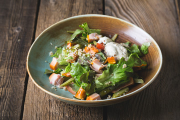 Vegetable salad with smoked chicken and quinoa