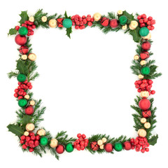 Christmas background square border with red, green and gold bauble decorations, with winter holly and juniper fir leaves on white background with copy space. Festive decoration.