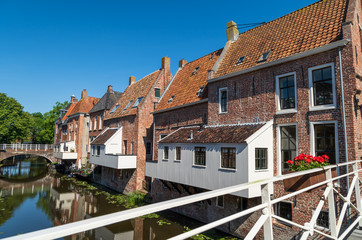 Fototapeta na wymiar The famous 'hanging kitchens' over the Damsterdiep in the old town of Appingedam, Groningen, Holland.