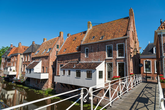 The famous 'hanging kitchens' over the Damsterdiep in the old town of Appingedam, Groningen, Holland.