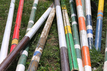 Outdoors photo of wooden barriers for jumping horses. Preparation of horses for performance on...