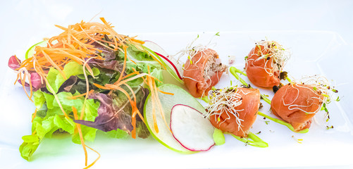 Salmon roll and salad