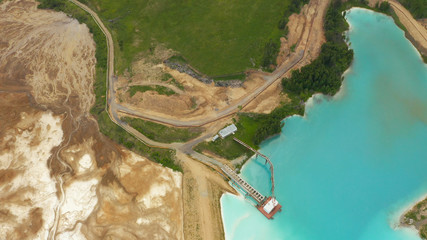Artificial lake for discharging chemical waste from a chemical plant. Environmental pollution....