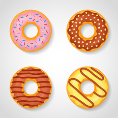 Set of sweet glazed donuts isolated on white background.