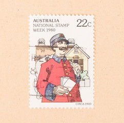 AUSTRALIA - CIRCA 1980: A stamp printed in Australia shows a mail man, circa 1980