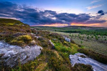 Sunset viewed from top of Great Wanney Crag, on the edge of Northumberland National Park, is a remote escarpment popular for rock climbing and walking