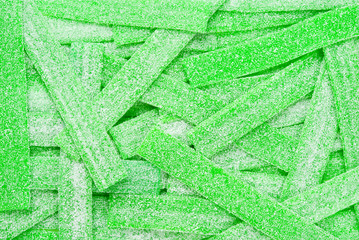 Green juicy gummy candies background. Top view. Jelly  sweets.