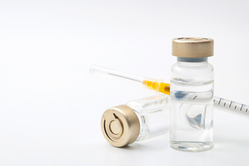 Vaccines, botulinum toxin and insulin ampules concept theme with glass vials with clear liquid next...