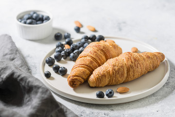 Croissants on a white Terence on a light table