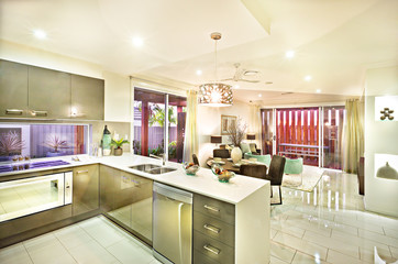 Modern kitchen and the hanging lights over the dinner