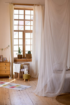 Children's room interior with wood furniture