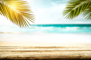 Desk of free space and beach summer background 