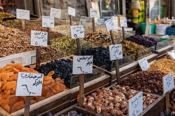 Spices, nuts and sweets shop on the market in Amman downtown, Jordan. Choice of Arabic spices on the Middle East bazaar, Jordan
