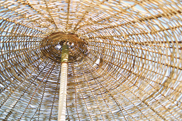 Close up of a straw parasol. Summer conсept. - Image