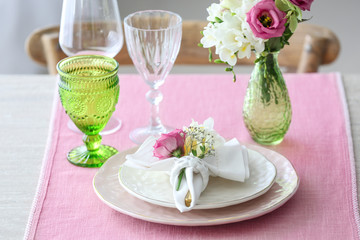 Beautiful table setting with fresh freesia flowers