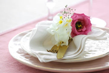 Fototapeta na wymiar Beautiful table setting with fresh freesia flowers, closeup