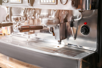 Modern coffee machine in cafe