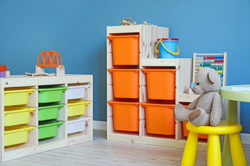 Stylish interior of modern playroom in kindergarten