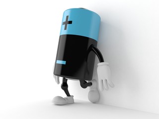 Battery character leaning on wall on white background