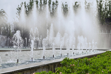 Fountains against the palm trees of the Spanish resort of Salou.