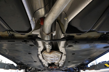 Sharp technical photograph.  The design and elements of a modern car. Details of the exhaust...