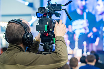 Wireless HD video transmission. Videographer is shooting events. Video transmission via wi-fi....