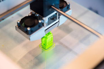Automatic three dimensional 3d printer performs product creation. Modern 3D printing or additive...