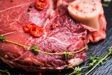 Raw fresh meat on the rustic background. Selective focus. Shallow depth of field. 