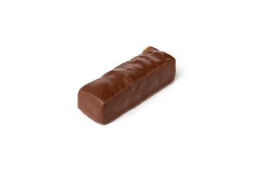 Chocolate sweet with caramel and peanut isolated on white background.