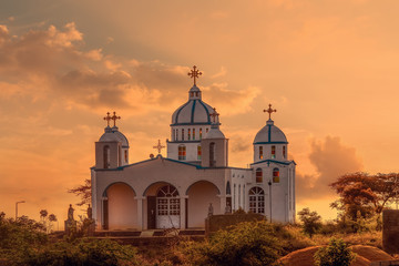 Beautiful architecture of Orthodox Christian Church in sunset, Oromia Region Ethiopia, Africa - obrazy, fototapety, plakaty