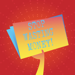 Writing note showing Stop Wasting Money. Business concept for advicing demonstrating or group to start saving and use it wisely Hand Holding Blank Space Color File Folder with Sheet Inside