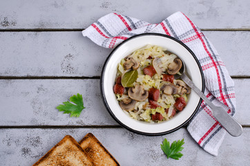 Stewed vegetables with sausages