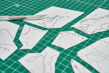 europe map with a ruler and a cutter