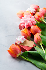 Spring background with orange tulips. women, mother day, greeting card