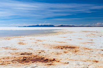 Landscape of incredibly white salt flat Salar de Uyuni, amid the Andes in southwest Bolivia, South America