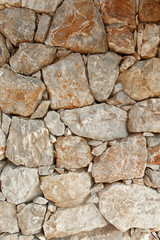 stone wall made of various stones, structure