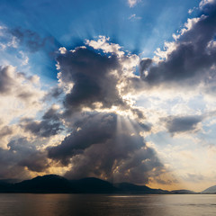 Sunlight through the clouds at dawn, island Koh Samui, Thailand
