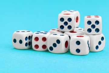 Gaming dices on blue background. Game concept.