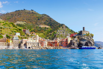 Liguria, Italy coastline of Riviera with colorful houses on sunny warm day. Monterosso al Mare, Vernazza, Corniglia, Manarola and Riomaggiore, Cinque Terre National Park UNESCO World Heritage