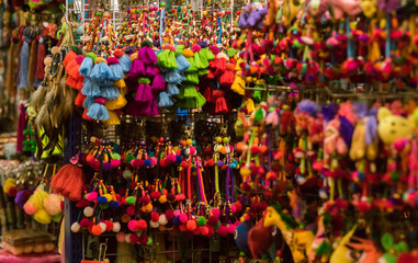 Naklejka premium Stuffed animals produced by hand. The string and the pendulum yarn of various colors. Be hung for decoration. Placed inside the Chatuchak weekend market. Bangkok, Thailand.