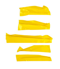 Set of yellow tapes on white background