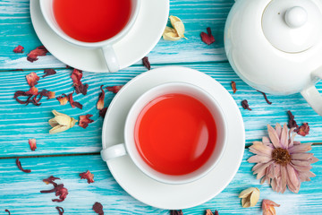 healthy herbal tea over blue background