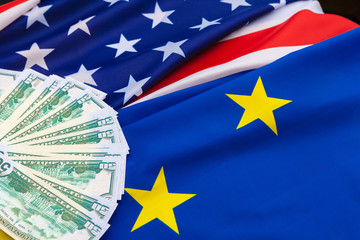 et, finance and nationalism concept - close up of american flag and cash money