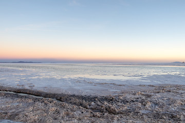 Sunset at Uyuni Salt Flats in Bolivia, the incredible salt desert in South America